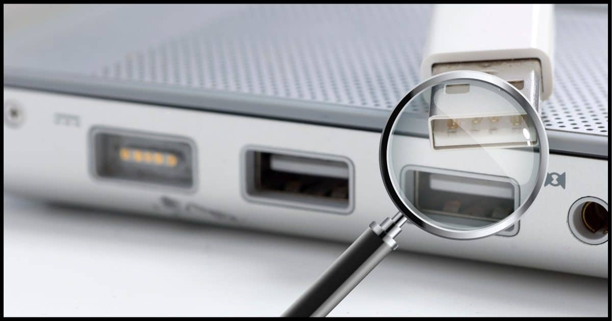 USB port under a magnifying glass.