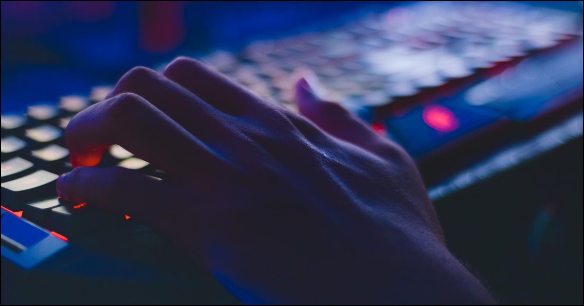 Hand above a keyboard