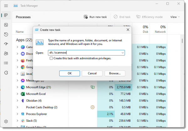 Task manager running the System File Checker.