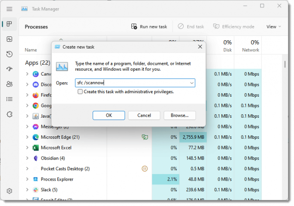 Task manager running the System File Checker. 