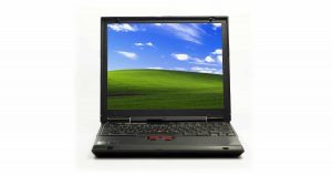 Older laptop with Windows XP background